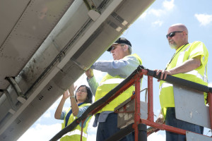 NASA Tests Aircraft Wing Coatings that Slough Bug Guts 2 NASA materials scientist Mia Siochi and systems engineer Mike Alexander, from the agency's Langley Research Center in Hampton, Virginia, and Boeing technician Felix Boyett count insect residue on the right wing of Boeing’s ecoDemonstrator 757 aircraft following a flight test in Shreveport, Louisiana. Credits: NASA/Paul Bagby