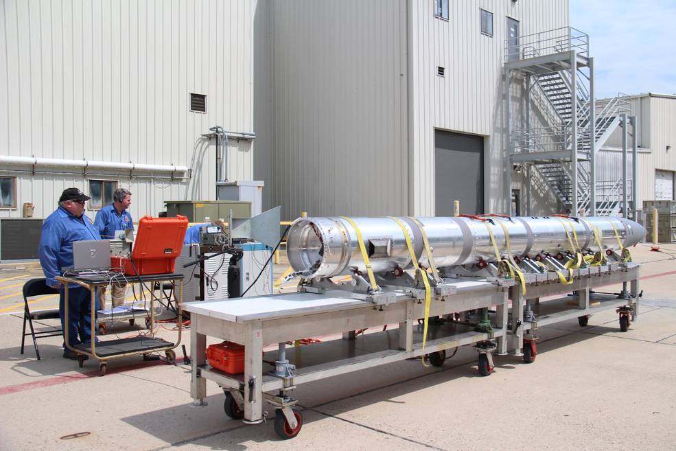 NASA Testing Space Technologies with Wallops Rocket Launch July 7 2 The NASA sounding rocket payload carrying two space technology development projects goes through GPS checks at the Wallops Flight Facility by technicians Tom Malaby (left) and Darren Ryan. Credits: NASA/Berit Bland