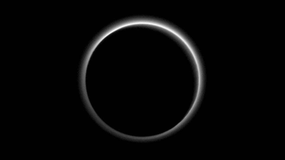 NASA’s New Horizons Team Finds Haze, Flowing Ice on Pluto 2 Backlit by the sun, Pluto’s atmosphere rings its silhouette like a luminous halo in this image taken by NASA’s New Horizons spacecraft around midnight EDT on July Credits: NASA/JHUAPL/SwRI