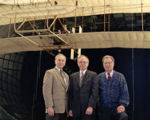 Bill Berry, former Ames Deputy Director, Harry McDonald, former Ames Director and John W. “Jack” Boyd, Senior Advisor to the Ames Center Director in the NFAC wind in front of a full-scale replica of the 1903 Wright ‘Flyer’ prior to testing. Credits: NASA Ames, Tom Trower