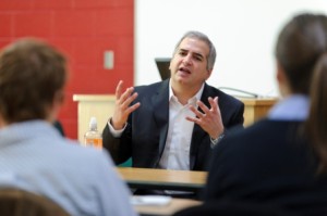 Anthony Shadid (center) speaks to a group of journalism students in a Vilas Hall classroom at the University of Wisconsin-Madison. (Photo by Bryce Richter / UW-Madison)