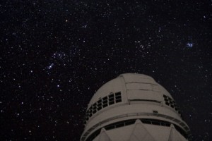 Likely new planet may be in slow death spiral 5 CAPTION: The Orion constellation as seen over the Mayall 4-meter Telescope on Kitt Peak. (Image courtesy of J. Glaspey/NOAO/AURA/NSF)