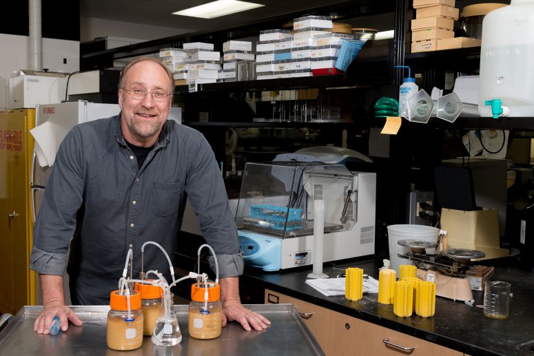 UW-Madison food science Professor James Steele with homemade fermenters he’s using to explore genetic engineering of lactic acid bacteria, a common contaminant of many fermentation processes, including cheese, wine, beer and biofuel production. PHOTO: SEVIE KENYON 