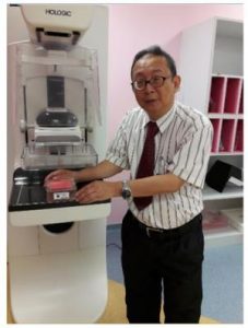 Prof. Dr Kwan Hoong NG performing quality control test on the Hologic Mammography unit. Credit : Professor Kwan Hoong NG