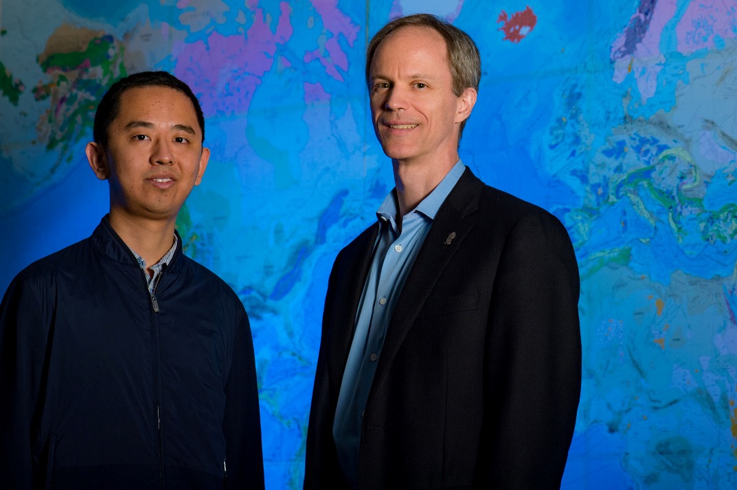 A computer model of human migration in the Americas by Rice University researchers Dong Wang (left) and Michael Deem could also shed light on the behavior of metastatic cancers. (Photo by Jeff Fitlow/Rice University)