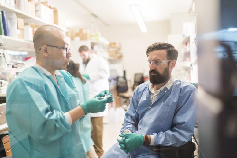 Jue Zhang and Matt Brown in lab